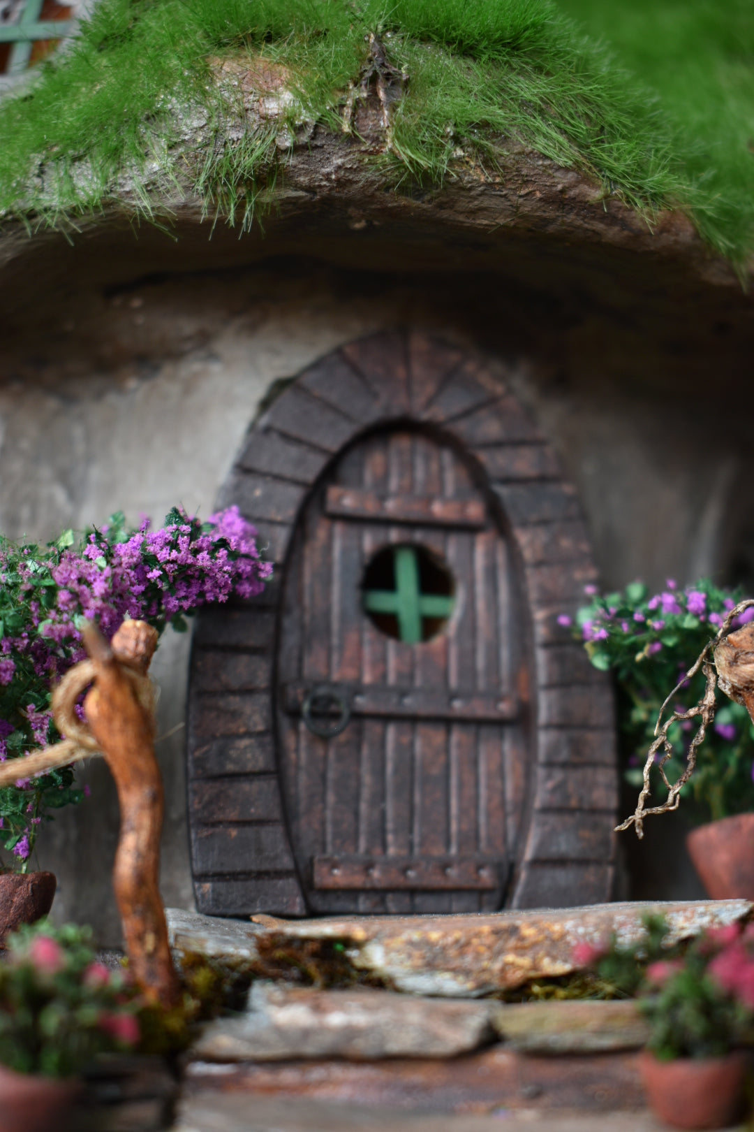 Diorama Treehouse with vibrant grass and charming oval windows, nestled under the sprawling canopy of a tree. Totally  handmade by HandiCraftArt.