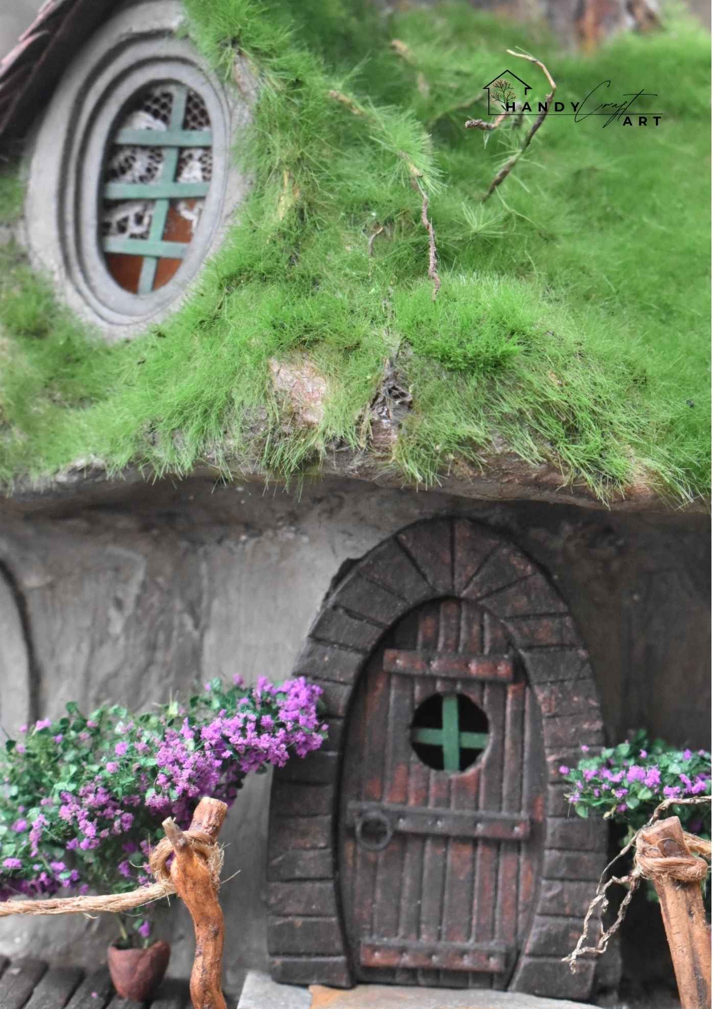 Collectible fantasy diorama for miniature lovers. Gnome house with a wooden door and grass roof by HandicraftArtie.